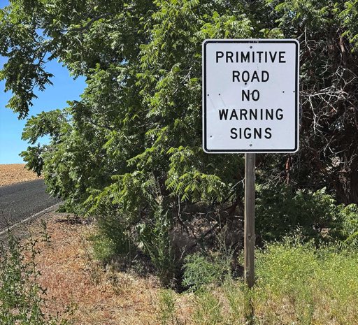 Primitive road warning on Waterville Plaateay, wheat country on Waterville Plateau, Jeff King Photogaphy, iPhine 16 Pro, Waterville Plateau